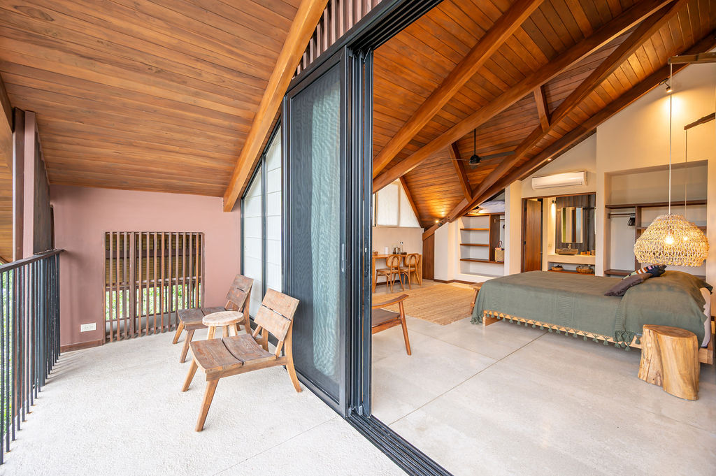 Loft suite seen from its terrace with the corner sliding wall fully open
